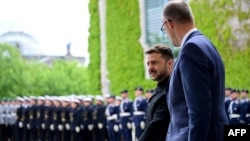 Zelenskyy Says Global Powers Must Put More Pressure On Russia After Meeting Merz In Berlin