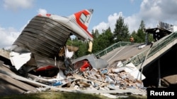 Officials Blame Explosions For 2 Separate Train Crashes In Western Russia; 7 Killed