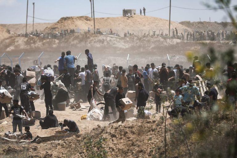 Dozens of Palestinians killed en route to aid hub, health authorities claim