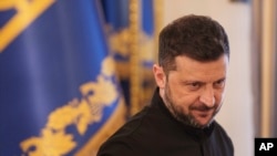 Zelenskyy Calls On Putin To Sign Cease-Fire, Meet Him ‘Any Day’
