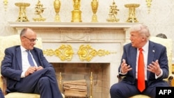 Trump Suggests Letting Ukraine And Russia ‘Fight For a While’ As Merz Urges Cooperation