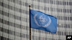 Iran Vows To Respond After IAEA Passes Noncompliance Resolution