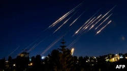 Civilians In Israel, Iran Seek Shelter, Brace For New Waves Of Attacks