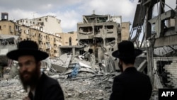 Israel Says Tehran Will ‘Pay Price’ As Attacks By Both Sides Escalate