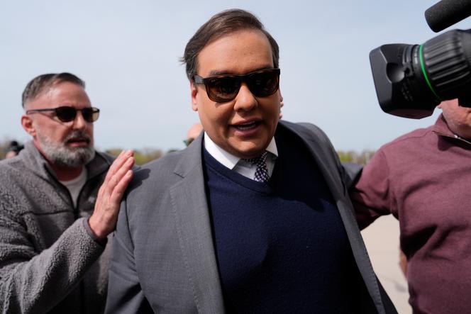 Disgraced George Santos reports to federal prison to serve 7-year fraud sentence
