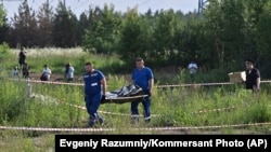 Former Russian Transport Minister Buried As Questions Over His Death Swirl