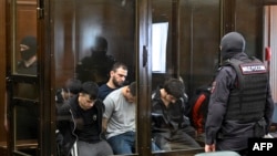 Main Suspects In 2024 Moscow Terrorist Attack Plead Guilty On First Day Of Trial