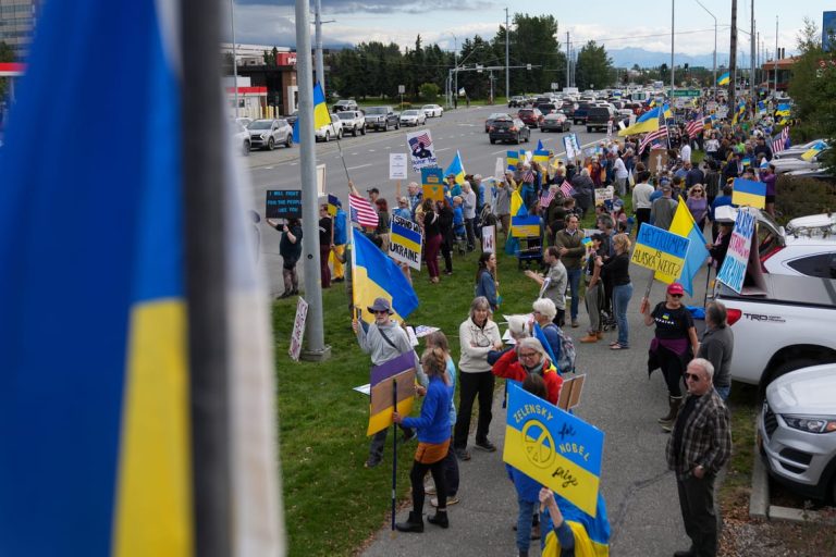 Alaskans greet Putin with Ukrainian flags, protest ‘war criminal hanging out here’