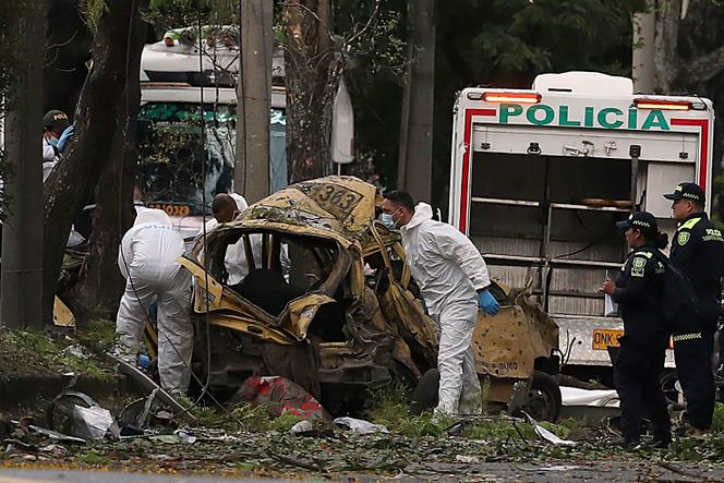 In Colombia, car bomb and attack on a helicopter kill at least 13