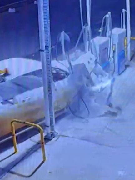 Service station erupts in fireball as stolen ute smashes into bowsers