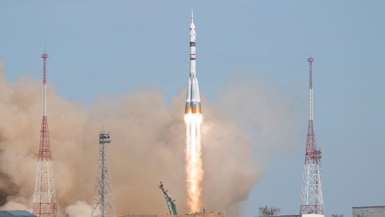 NASA astronaut and Russian crewmates arrive at the International Space Station