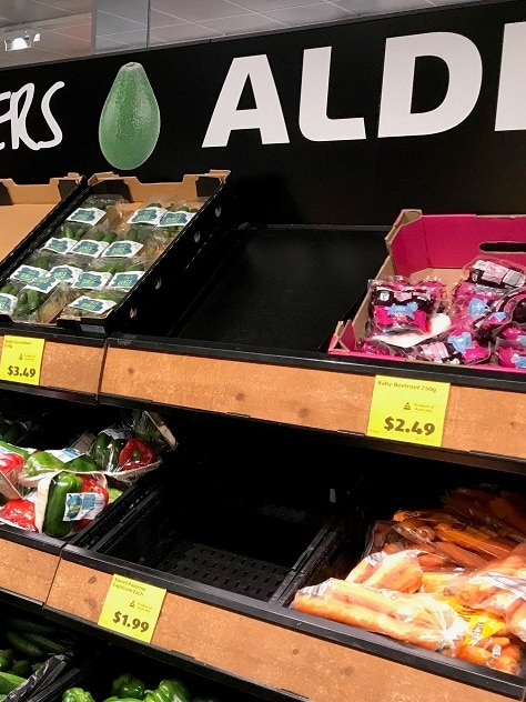 ACCC accuses four Aldi vegetable suppliers of fixing prices
