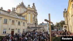 Ukrainians Pay Final Respects To Slain Politician As Alleged Killer Appears In Court