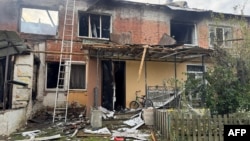 Ukraine Battles To Restore Power As Russian Strikes Batter Grid Sites