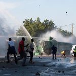 Two top opposition leaders arrested in Cameroon as post-election tensions mount ahead of results