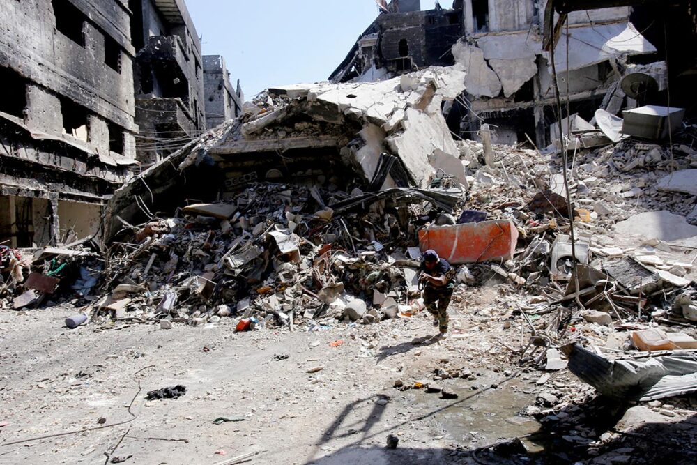 A Palestinian from Syria on trial for war crimes in Sweden