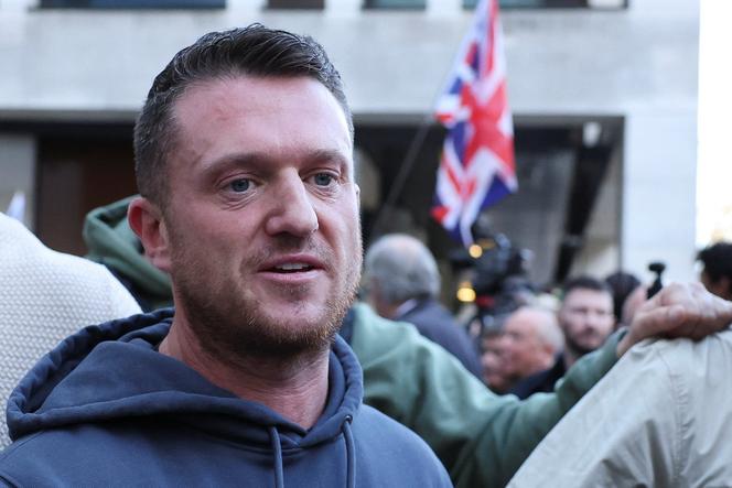 UK far-right activist Tommy Robinson cleared of refusing to give phone PIN to police