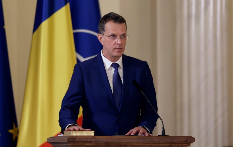 Romania’s defense minister resigns over false claims on his CV