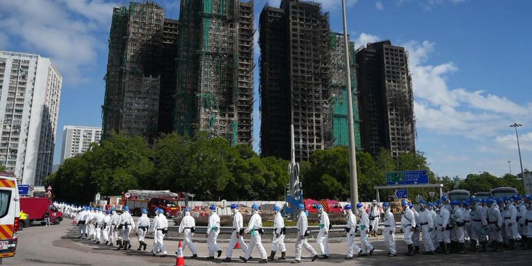 Hongkongers express solidarity and anger after fire: ‘For now, we restrain ourselves because we must honor the dead’