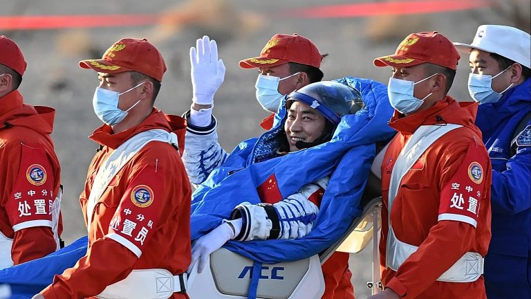 Chinese astronauts return to Earth after delay blamed on space debris damage