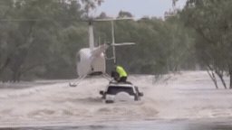Hero helicopter pilot saves men and dog from floodwaters in dramatic rescue near Katherine, NT