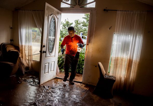 “Everything is soaked”: Hawaii residents return to flood-ravaged homes