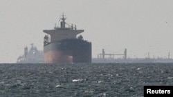 Ships Begin Moving Through Key Strait As Fragile US-Iran Truce Holds