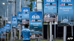 Iran, US Delegations Head To Islamabad As Mixed Signals Cloud Prospects For Talks