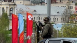 Ukraine Says It Hit Russian Caspian Sea Warship; Kremlin Boosts Security For May 9 Victory Day