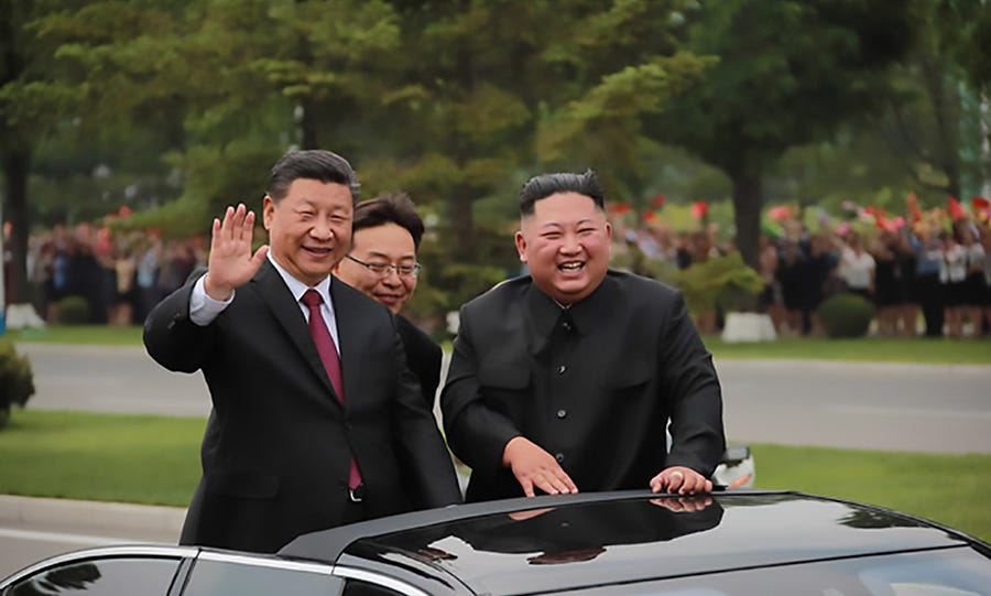 China’s Xi Visits North Korea Amid Concerns Kim Drifts Closer To Moscow