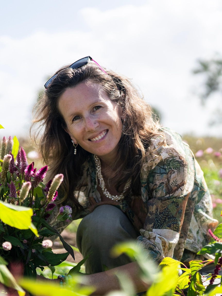 The women planting the seeds of a flower farm movement