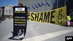 EU Officials Meet Taliban In Brussels For First Time Despite Outcry From Activists