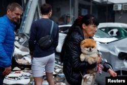 Russian Strikes Kill At Least 11 In Kyiv On Eve Of NATO Summit