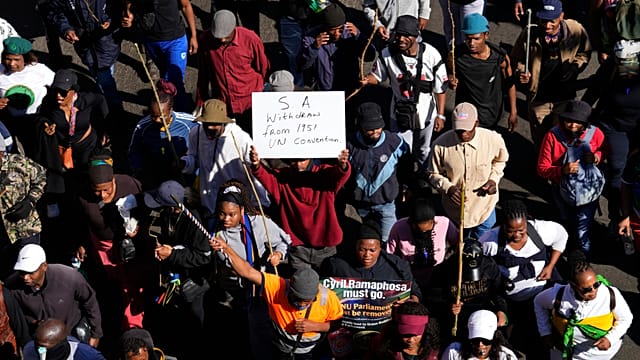 Protesters in South Africa pull undocumented foreigners from their homes