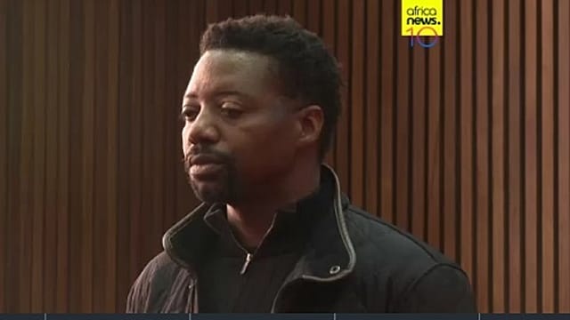 Man sought in killings of family in UK remains in custody in South Africa