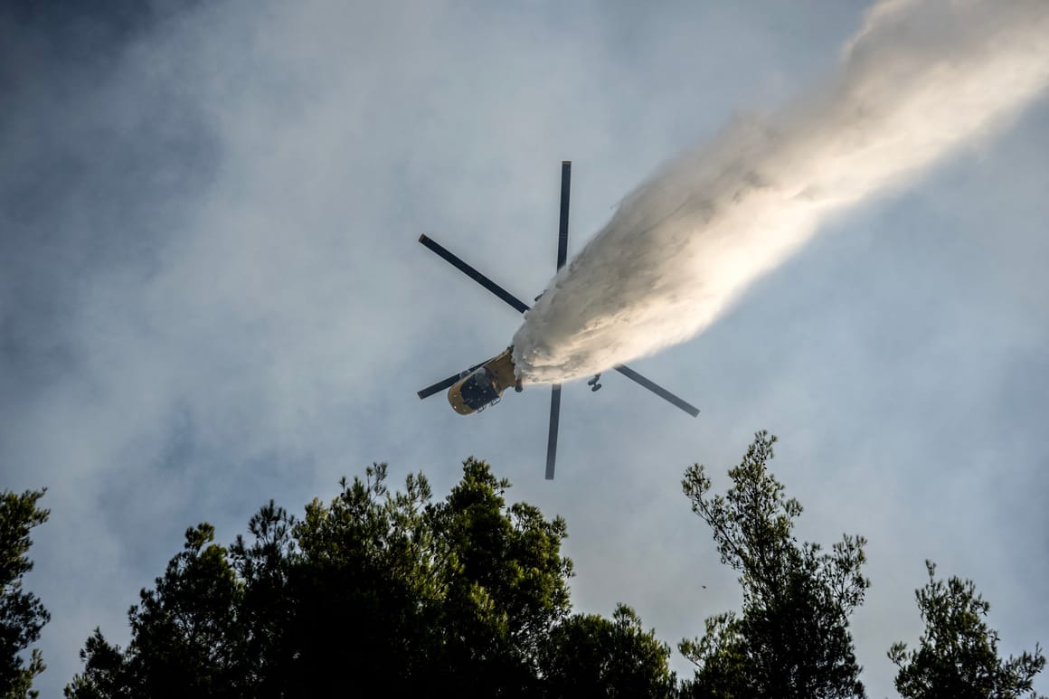 Choppers collide, killing 2, as fires and foreboding grip Greece