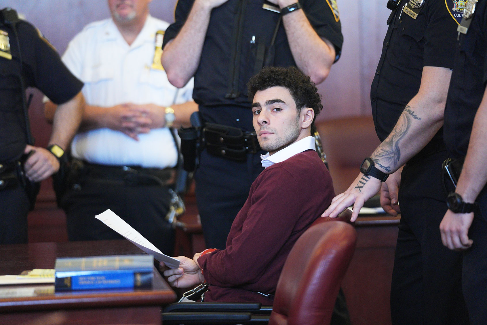 Luigi Mangione pleads guilty to killing health insurance CEO Brian Thompson