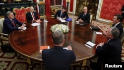 US Envoys Head To Kyiv After  Stop In Moscow, Late-Night Meeting With Putin