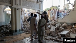 At Least 20 Killed In Suicide Attack On Police Headquarters In Northwestern Pakistan