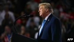 Trump Defends Russia Sanctions Waivers, Zelenskyy Warns Of Consequences